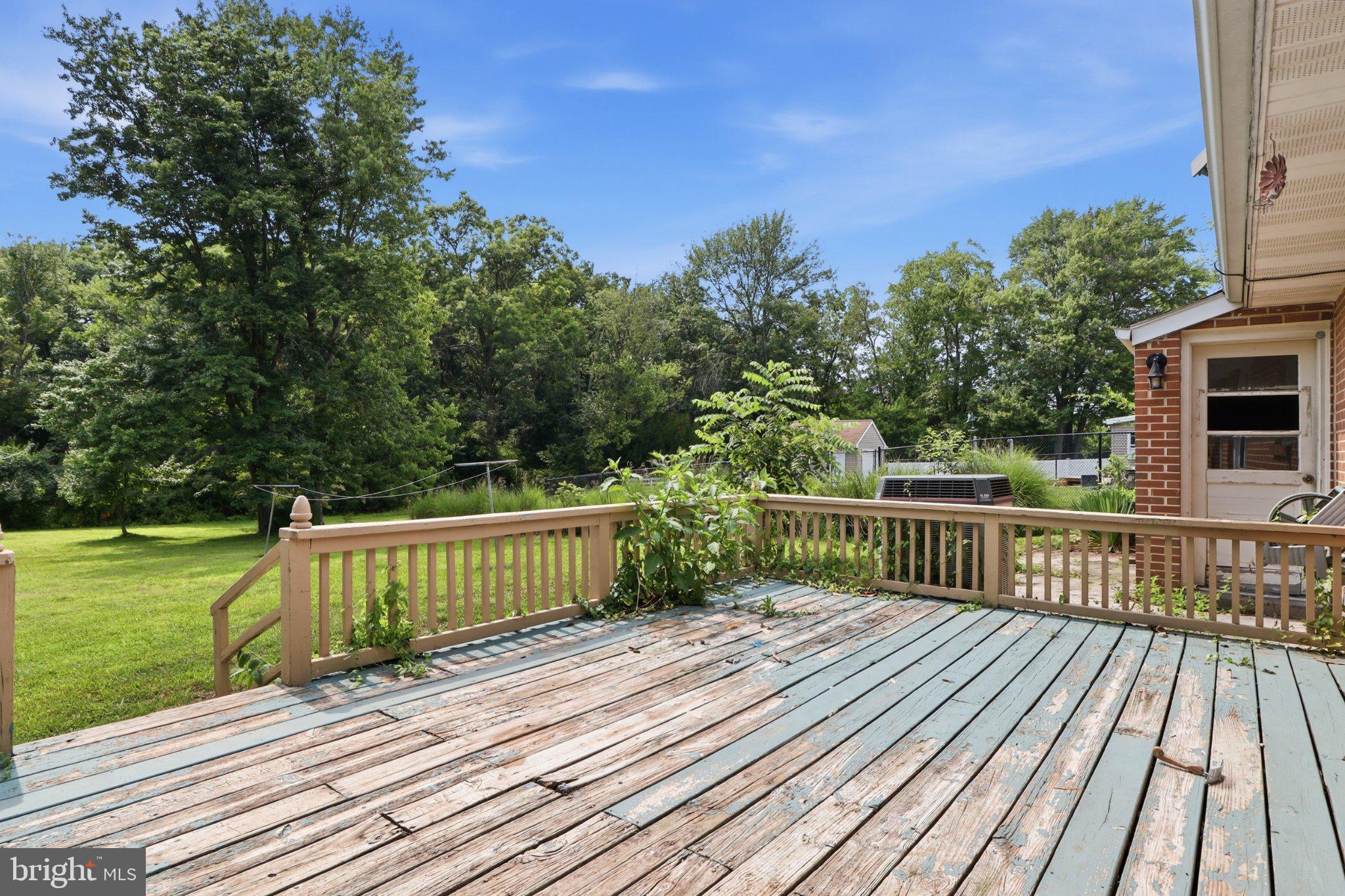 2400 Derry Road York, PA 17408 - Photo 34 of 56 Charming deck with lush greenery