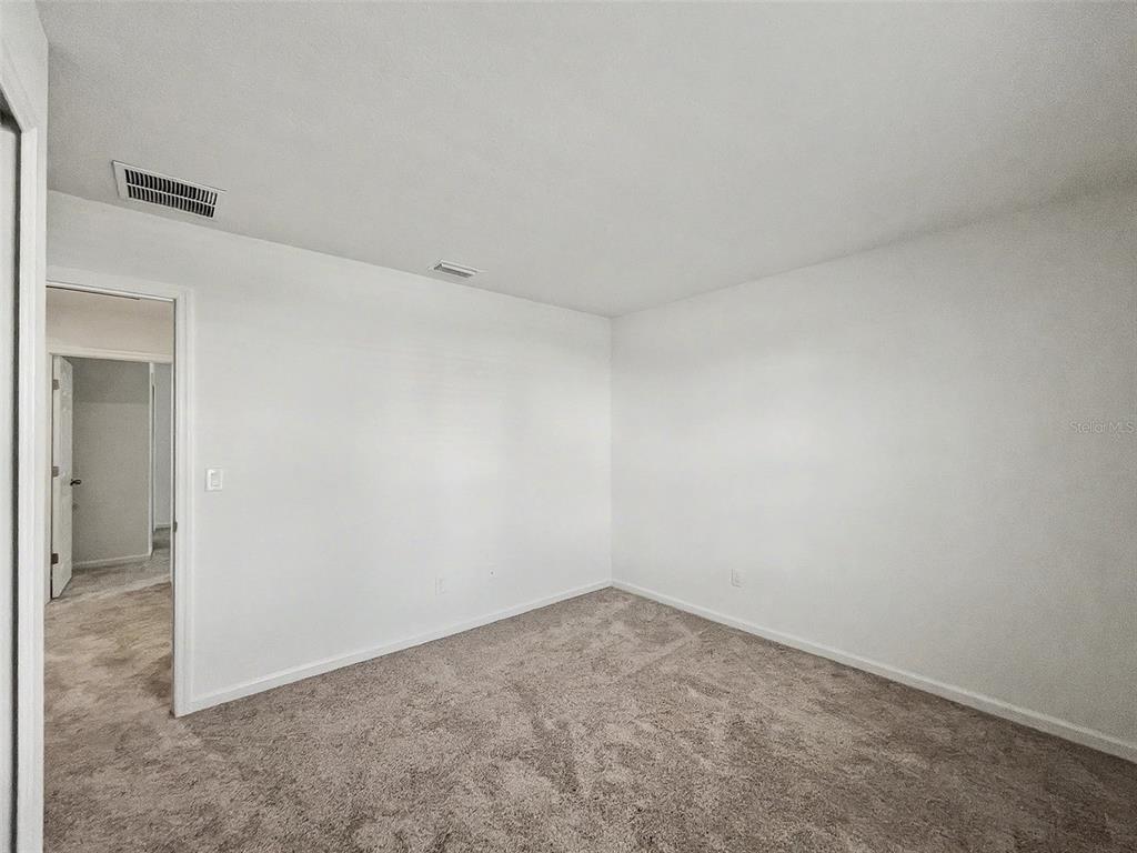 55 Signet Circle Flagler Beach, FL 32136 - Photo 33 of 39 an empty room with a workbench