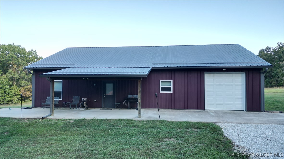 8960 White Tail Ridge Versailles, MO 65084 - Photo 2 of 25 front of house