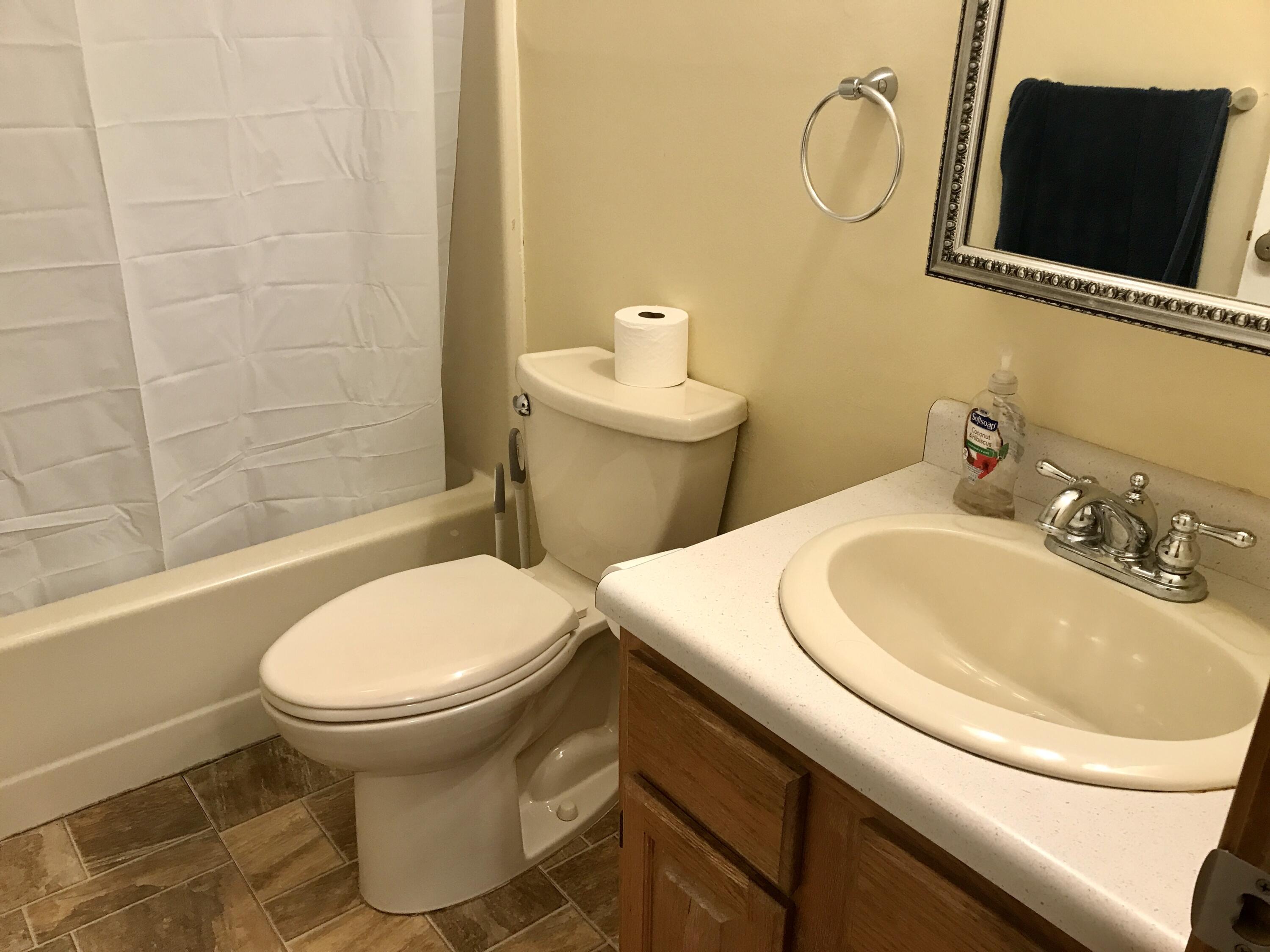 24 Papnomett Road Mashpee, MA 02649 - Photo 12 of 28 a bathroom with a sink and a toilet