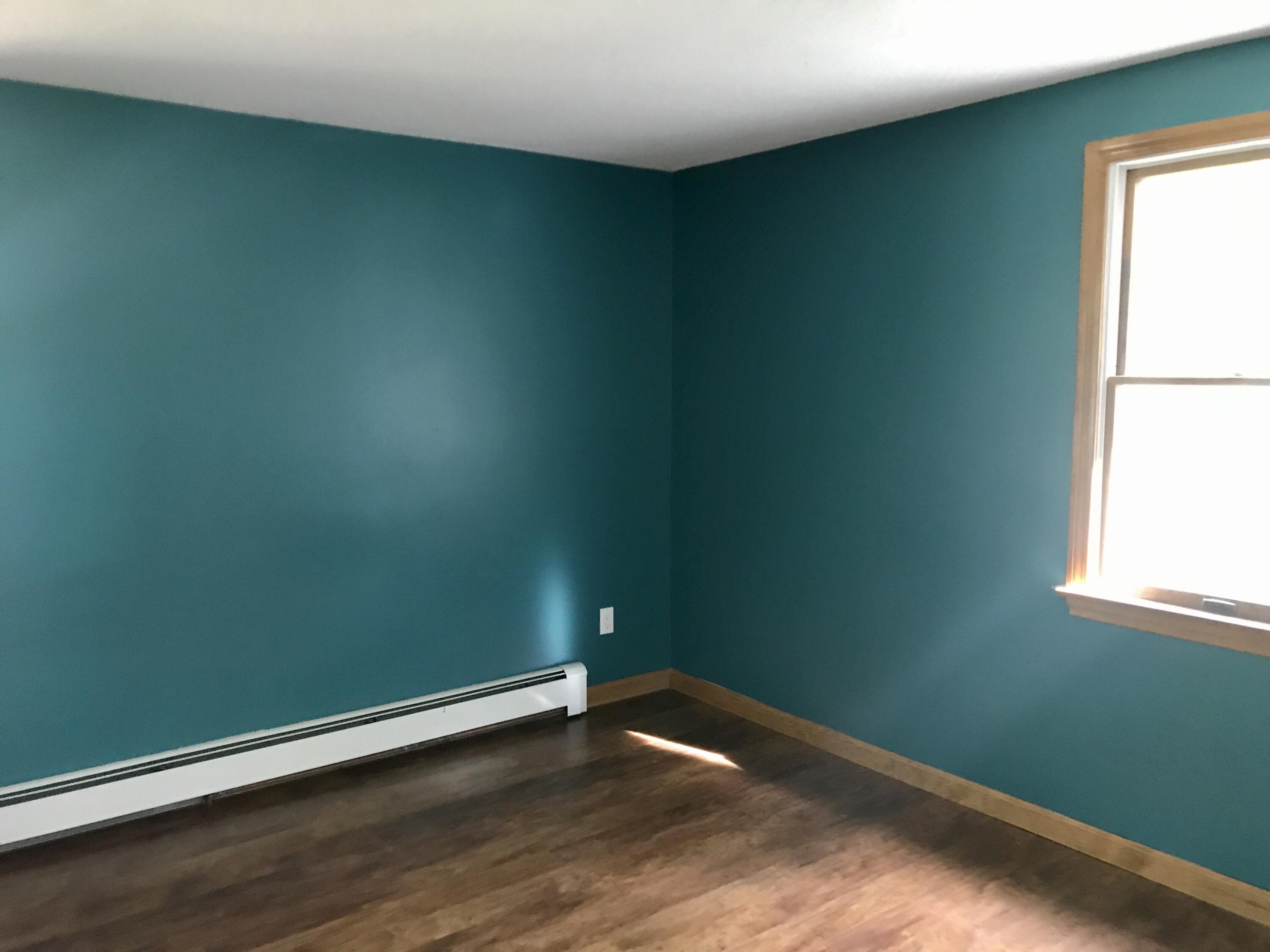24 Papnomett Road Mashpee, MA 02649 - Photo 16 of 28 a view of a room with wooden floor and windows