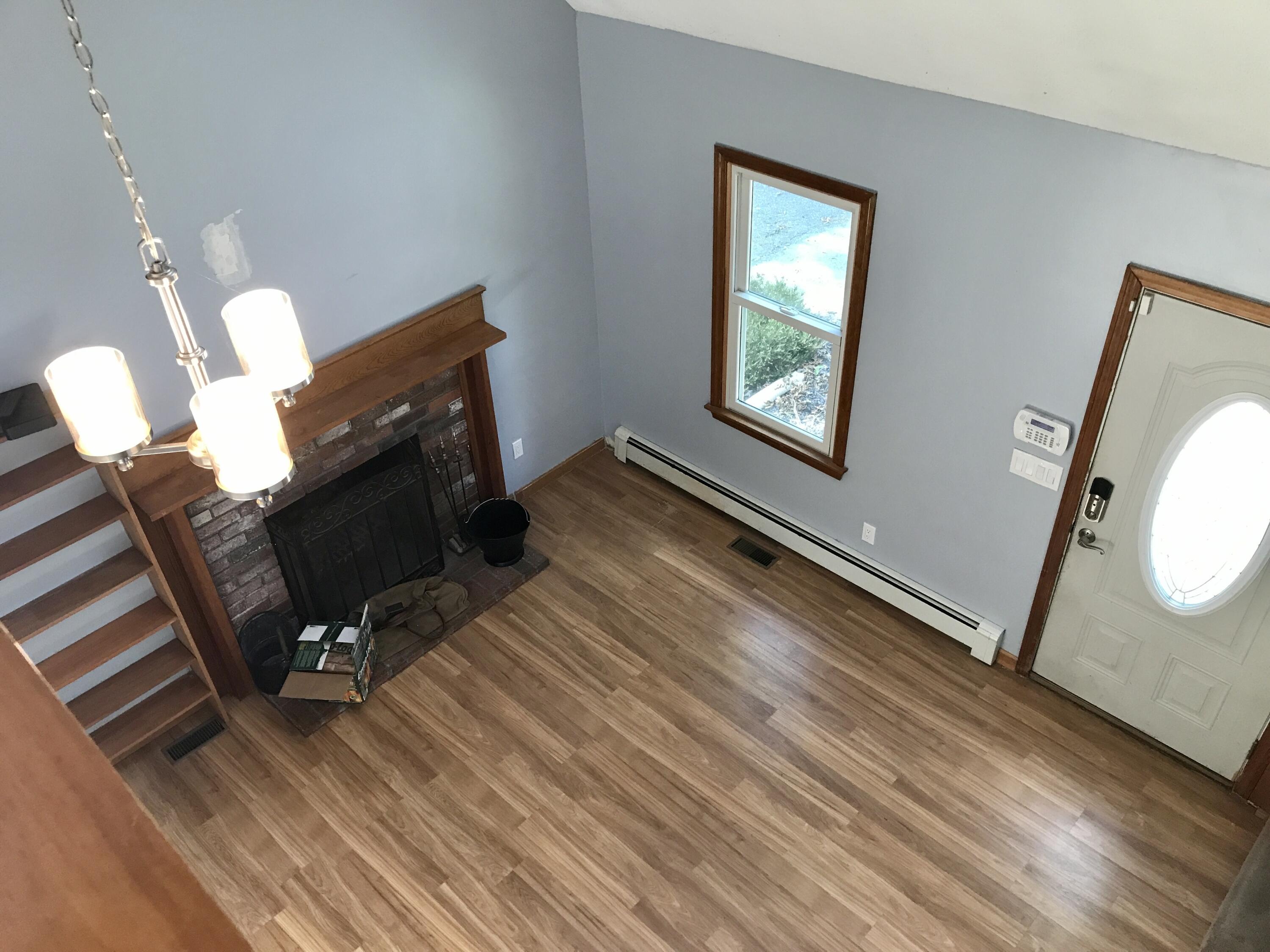 24 Papnomett Road Mashpee, MA 02649 - Photo 17 of 28 a view of workspace with wooden floor windows