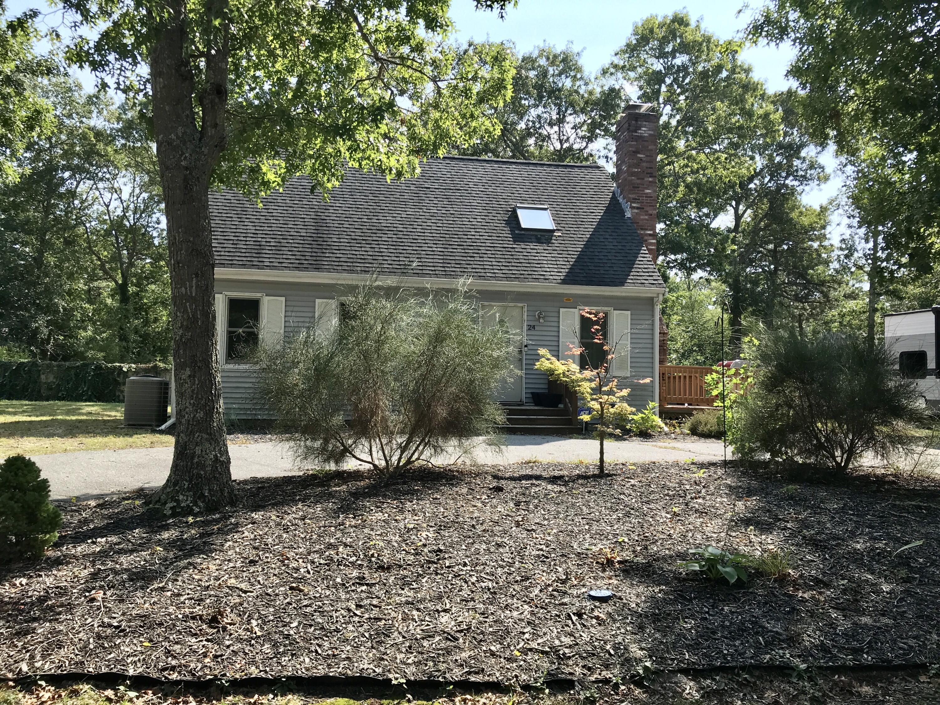 24 Papnomett Road Mashpee, MA 02649 - Photo 3 of 28 a view of a house with a yard