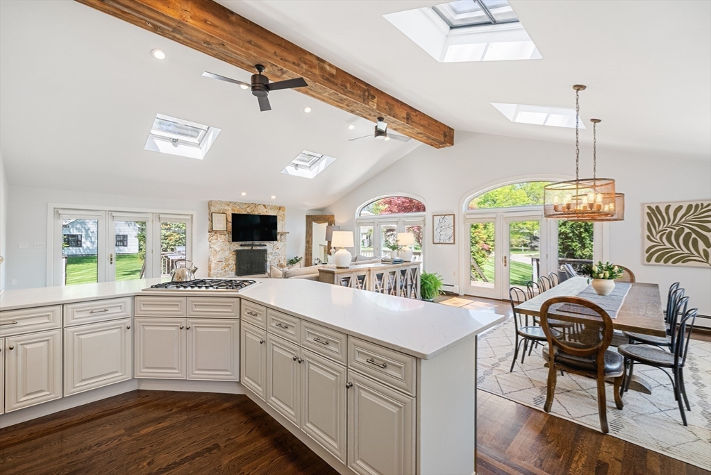 60 Perry Drive Westwood, MA 02090 - Photo 13 of 42 a kitchen with a sink window and cabinets