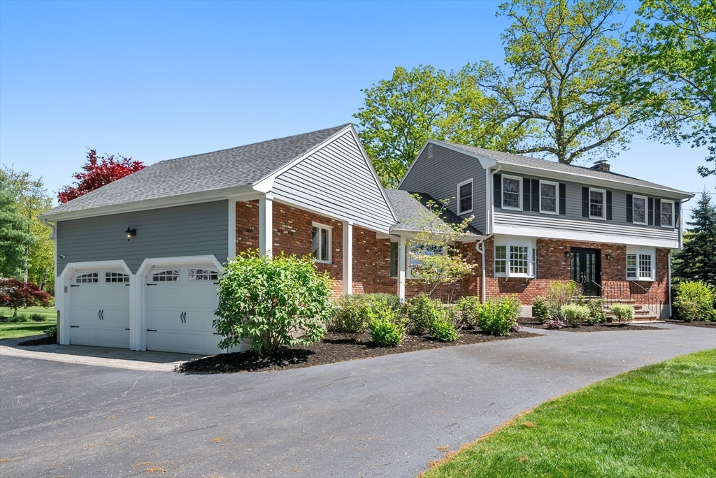 60 Perry Drive Westwood, MA 02090 - Photo 3 of 42 front view of a house with a yard