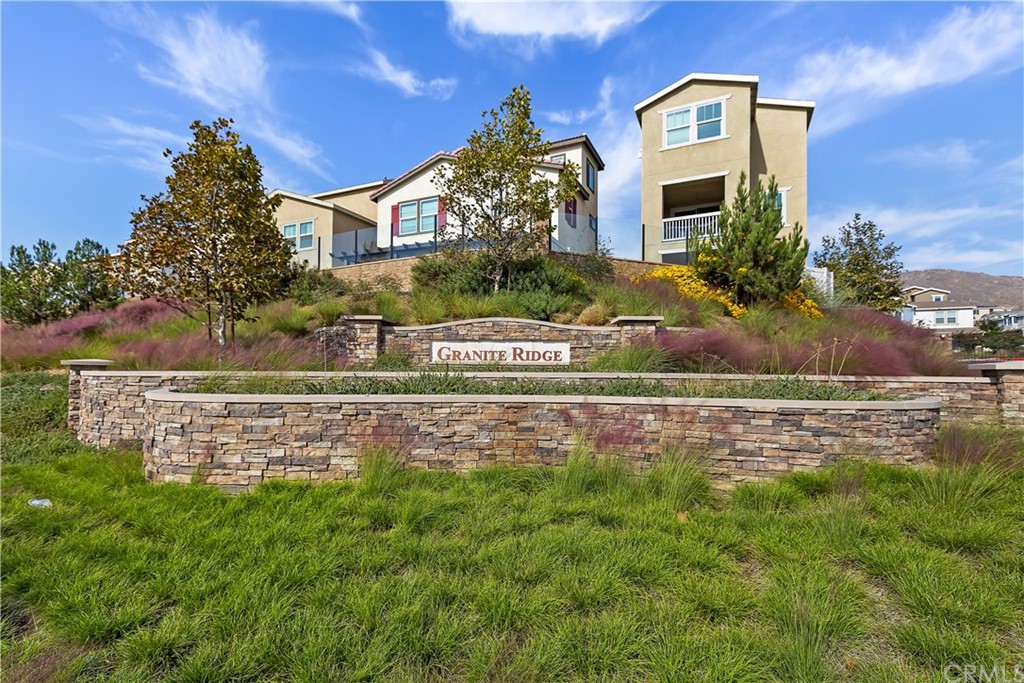 7347 Garnet Ridge Road Jurupa Valley, CA 92509 - Photo 1 of 1 a front view of a house with a yard