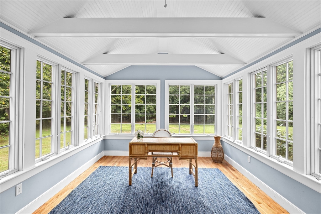 16 Liberty Road Hingham, MA 02043 - Photo 12 of 27 a living room filled with furniture and a large window