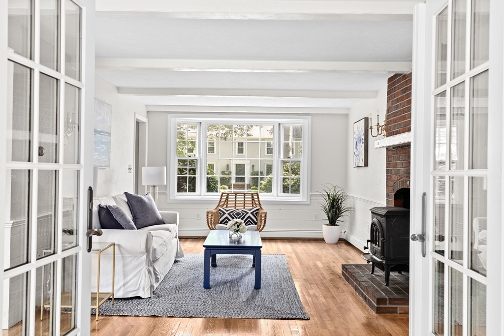 16 Liberty Road Hingham, MA 02043 - Photo 13 of 27 a living room with furniture large window and table