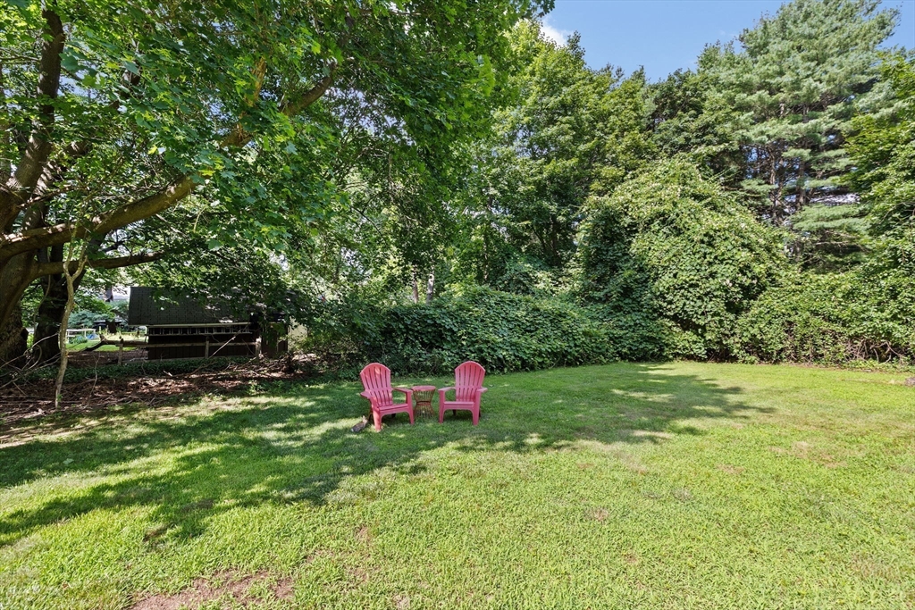16 Liberty Road Hingham, MA 02043 - Photo 25 of 27 a backyard of a house with table and chairs