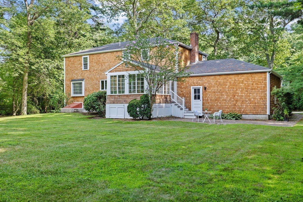 16 Liberty Road Hingham, MA 02043 - Photo 26 of 27 a front view of house with yard and green space