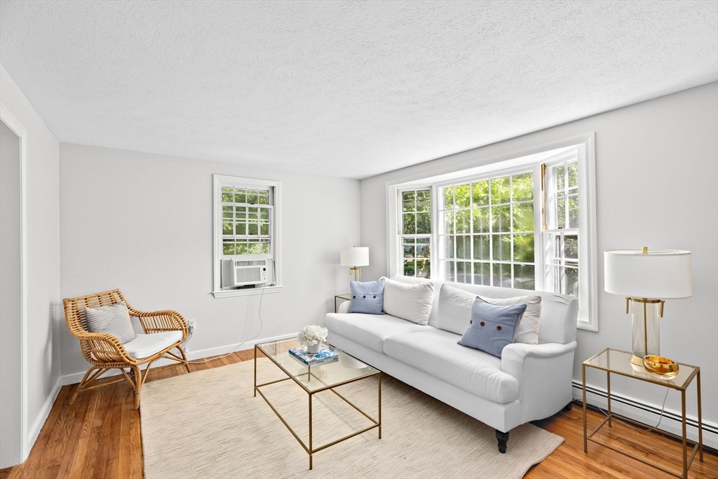 16 Liberty Road Hingham, MA 02043 - Photo 3 of 27 a living room with furniture and a window