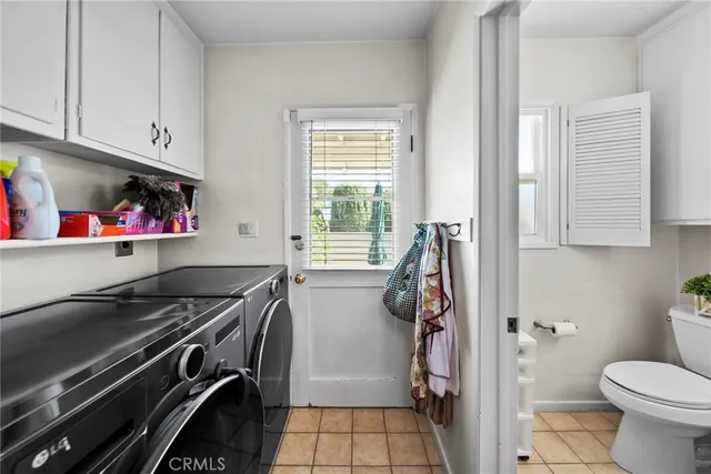 a view of a kitchen with appliances and cabinets