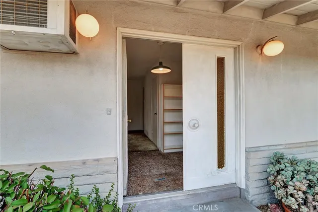 a view of a hallway with entryway