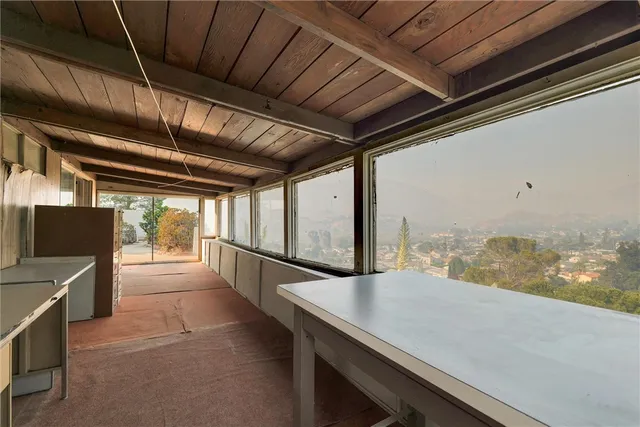 a view of a porch with furniture