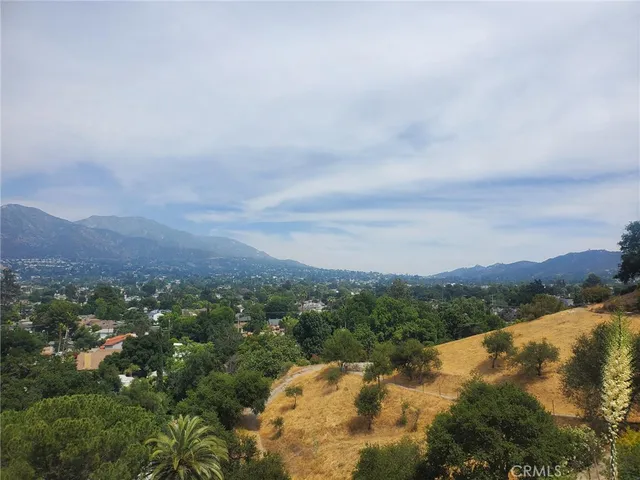 an aerial view of residential house and outdoor space