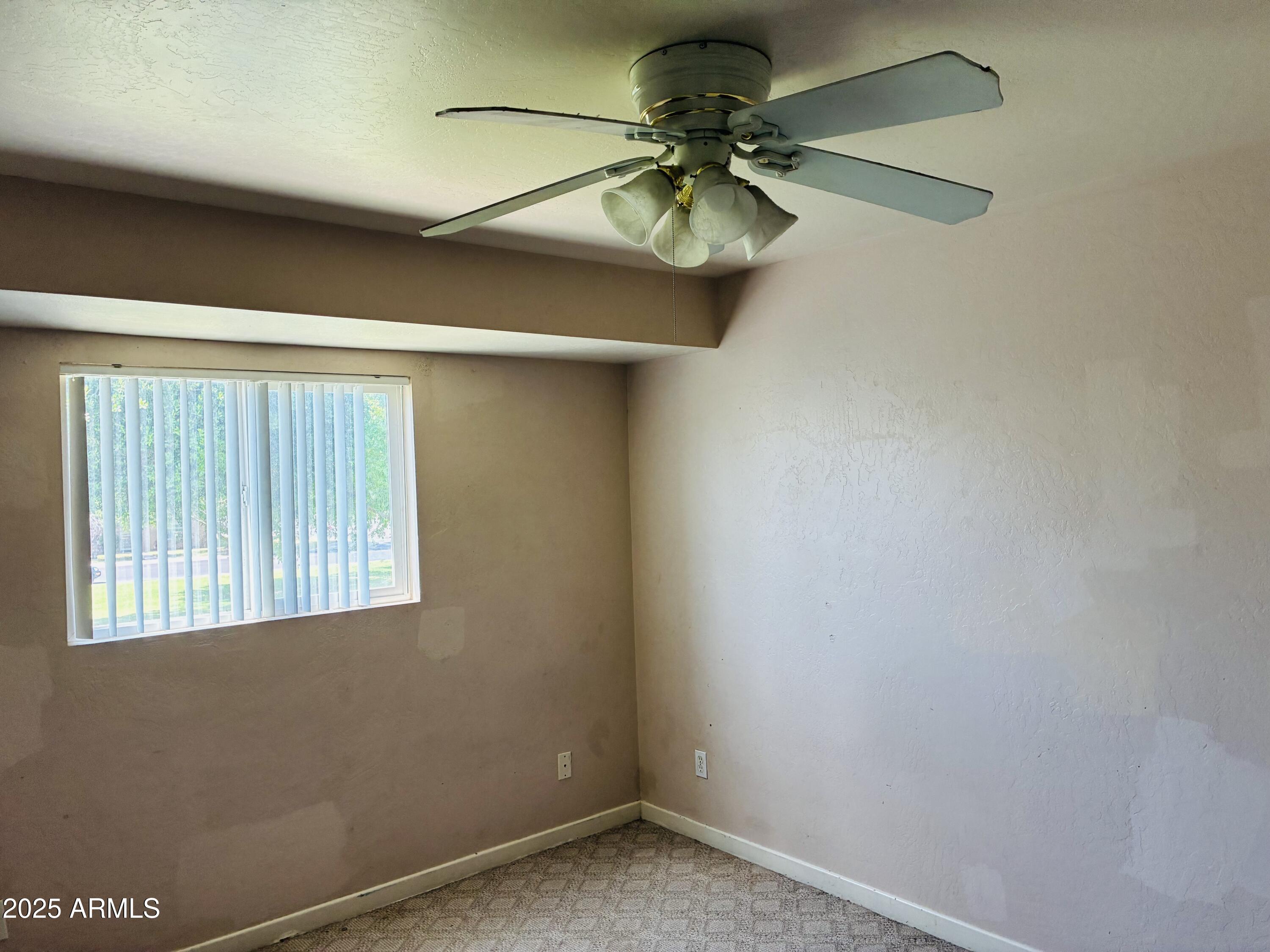 Undisclosed Address Tempe, AZ 85282 - Photo 13 of 23 a view of a window in an empty room