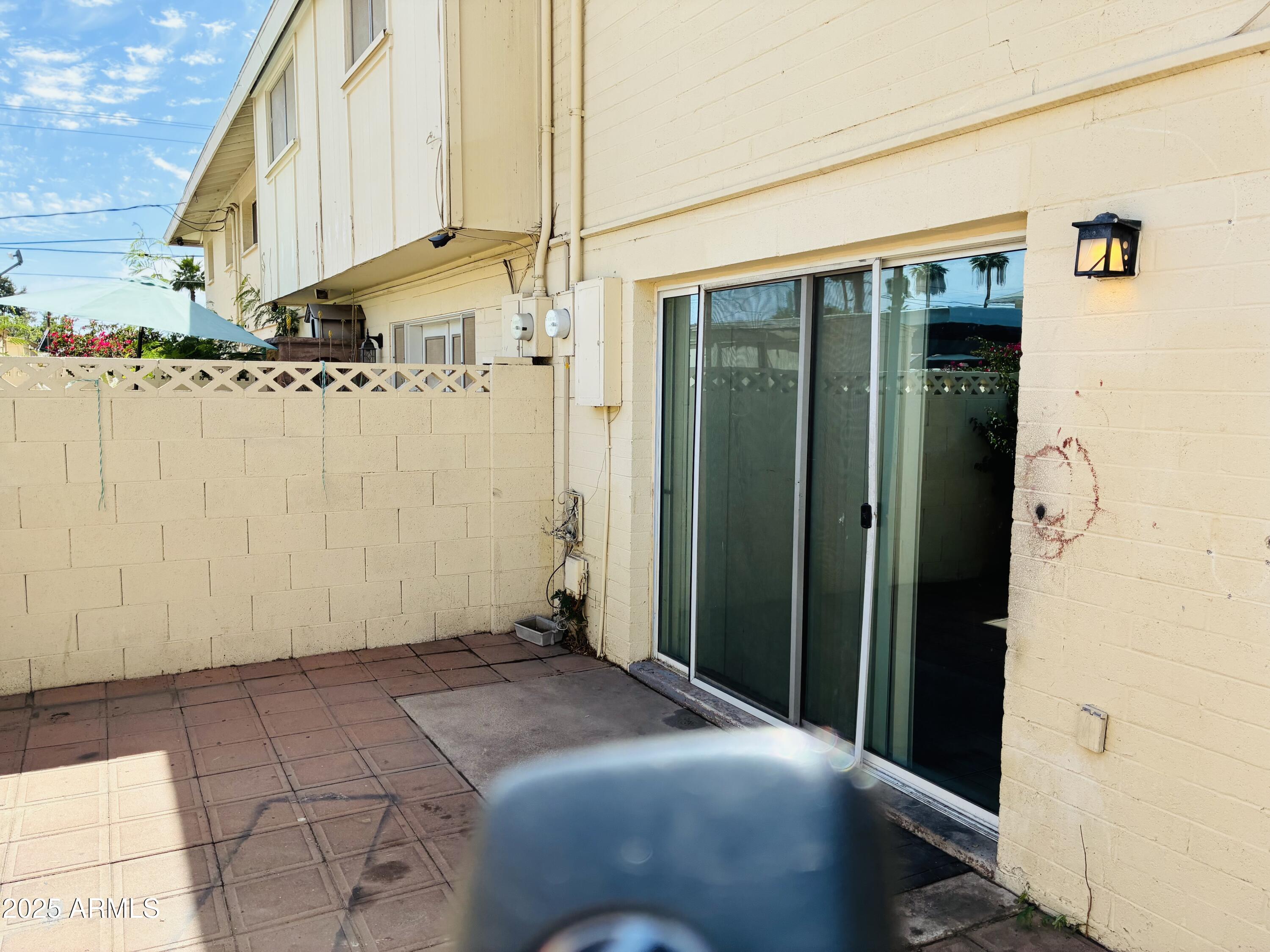 Undisclosed Address Tempe, AZ 85282 - Photo 21 of 23 a bedroom with a bed and a window