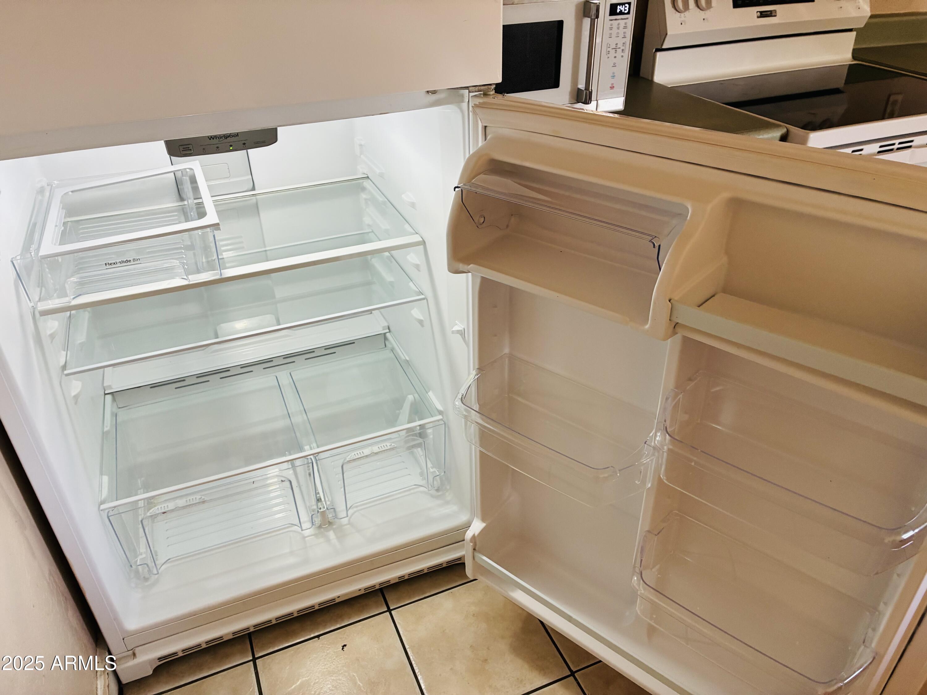 Undisclosed Address Tempe, AZ 85282 - Photo 5 of 23 a view of walk in closet with empty racks
