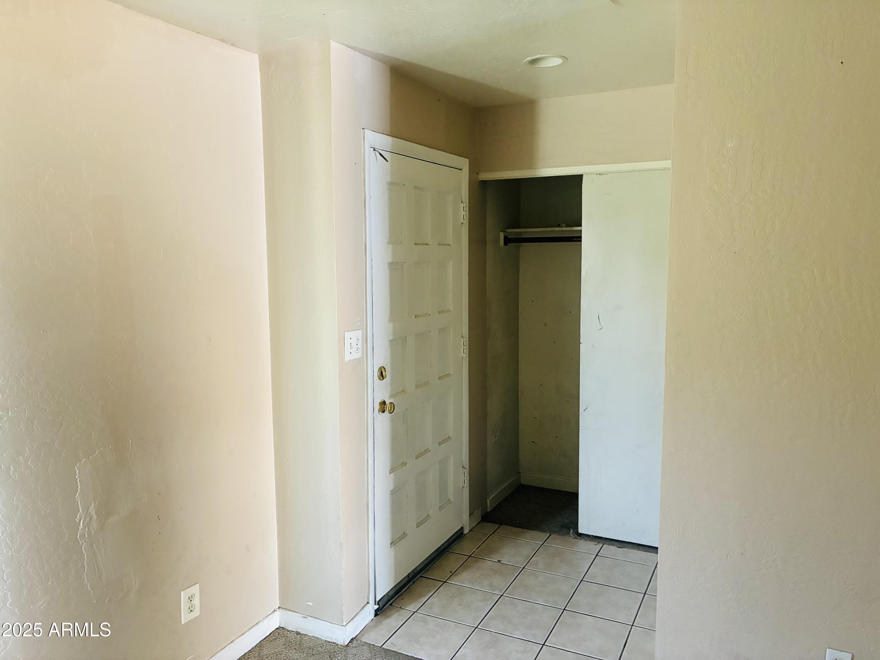 Undisclosed Address Tempe, AZ 85282 - Photo 9 of 23 a view of an empty room with closet