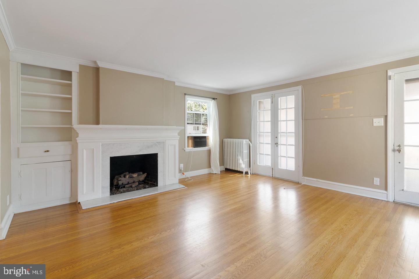 2910 Morris Road Ardmore, PA 19003 - Photo 3 of 11 Living room fireplace
