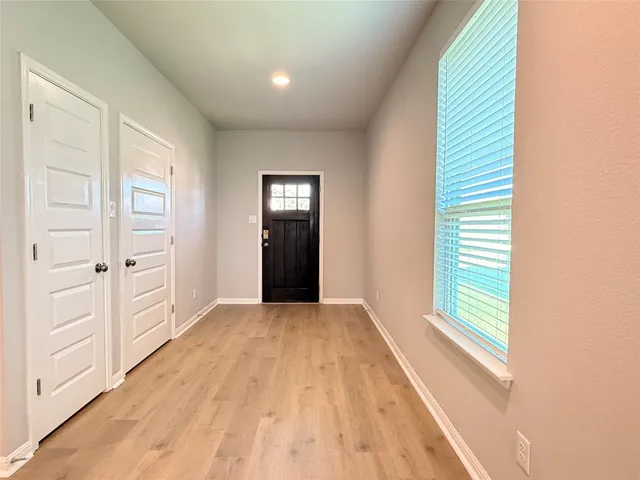 an empty room with windows