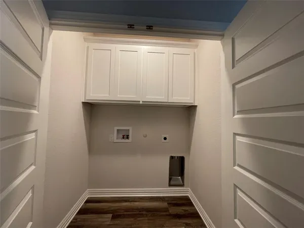 a view of storage and utility room with washer and dryer