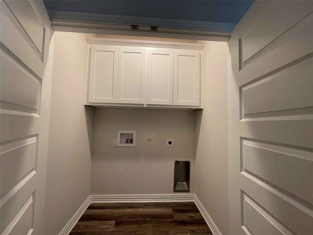 206 South Nolan River Road, Unit 6 Cleburne, TX 76033 - Photo 9 of 16 a view of storage and utility room with washer and dryer