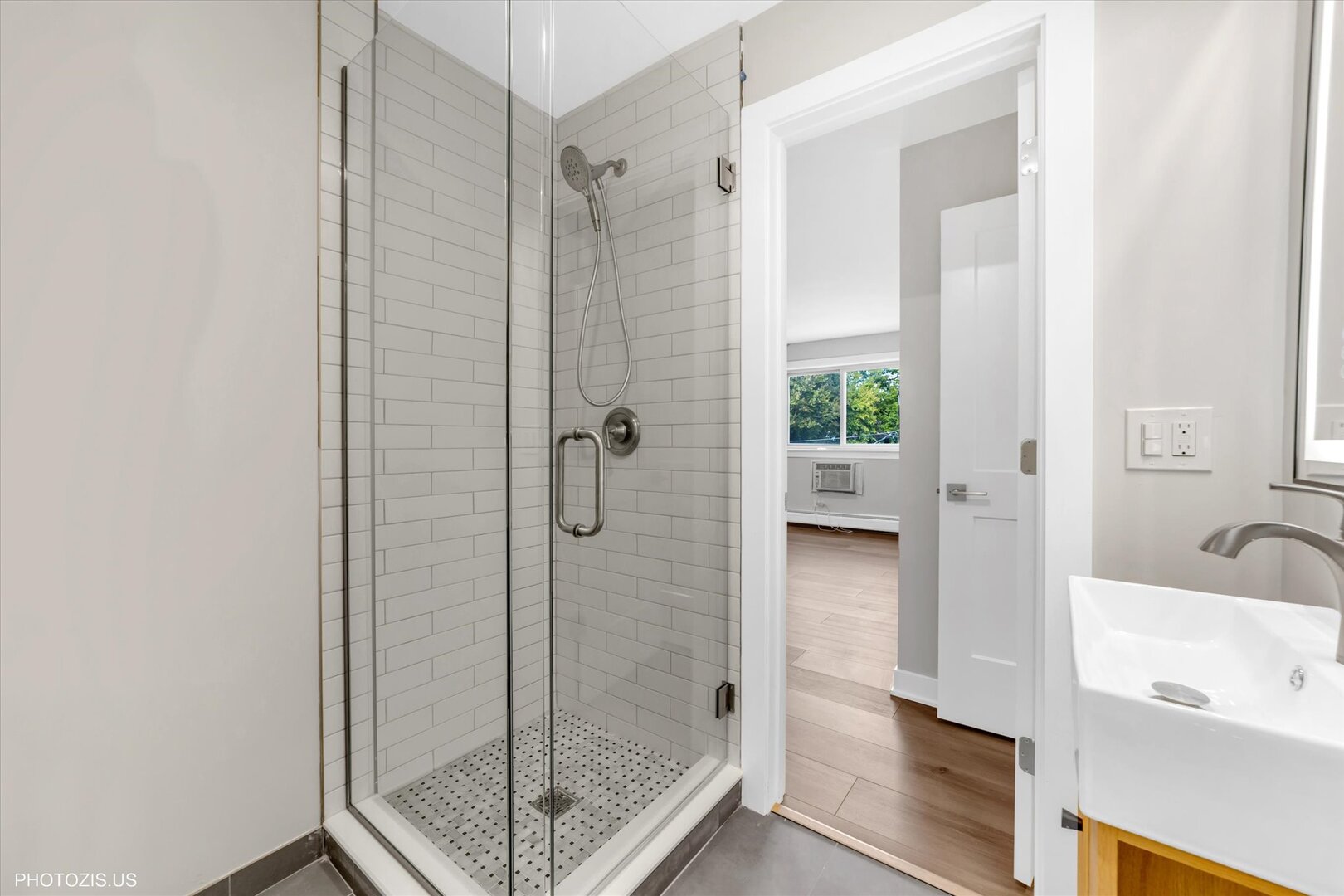 1640 West Sherwin Avenue, Unit 3B Chicago, IL 60626 - Photo 14 of 28 a bathroom with a shower and a sink