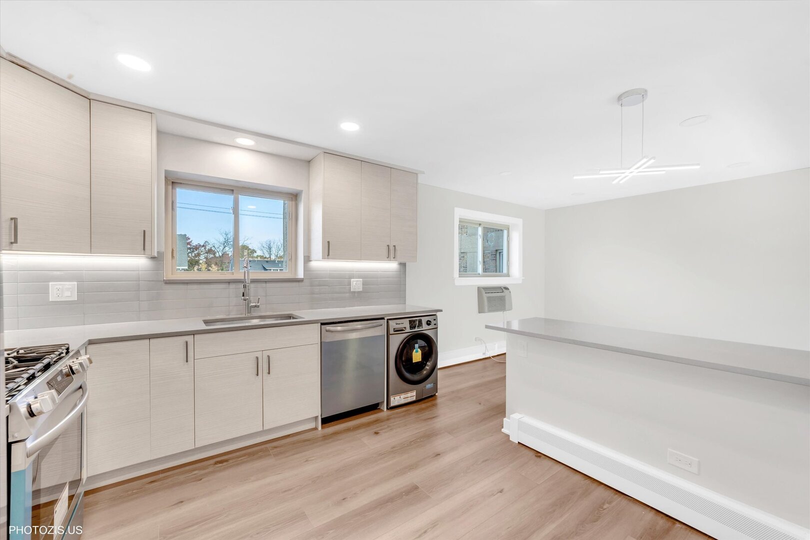1640 West Sherwin Avenue, Unit 3B Chicago, IL 60626 - Photo 8 of 28 a kitchen with white cabinets and sink