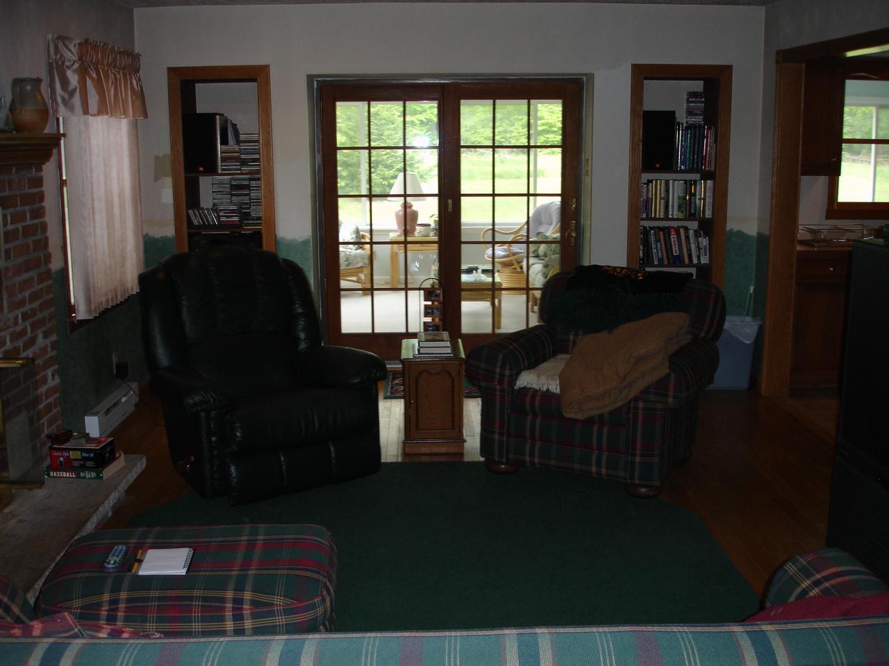205 Ross Road Tobyhanna, PA 18466 - Photo 9 of 17 Living Room, Brick Fireplace, Bookcases