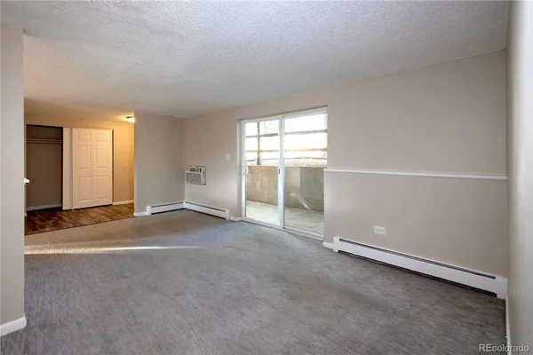 a bathroom with a toilet and a bathtub