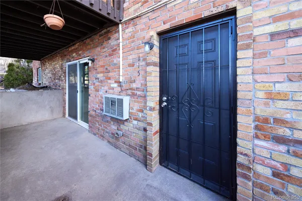 a view of roof deck with wooden fence
