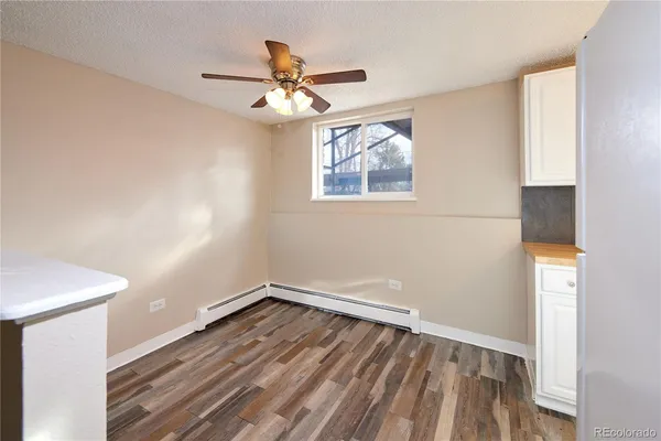 a kitchen with a refrigerator a stove top oven a sink and dishwasher