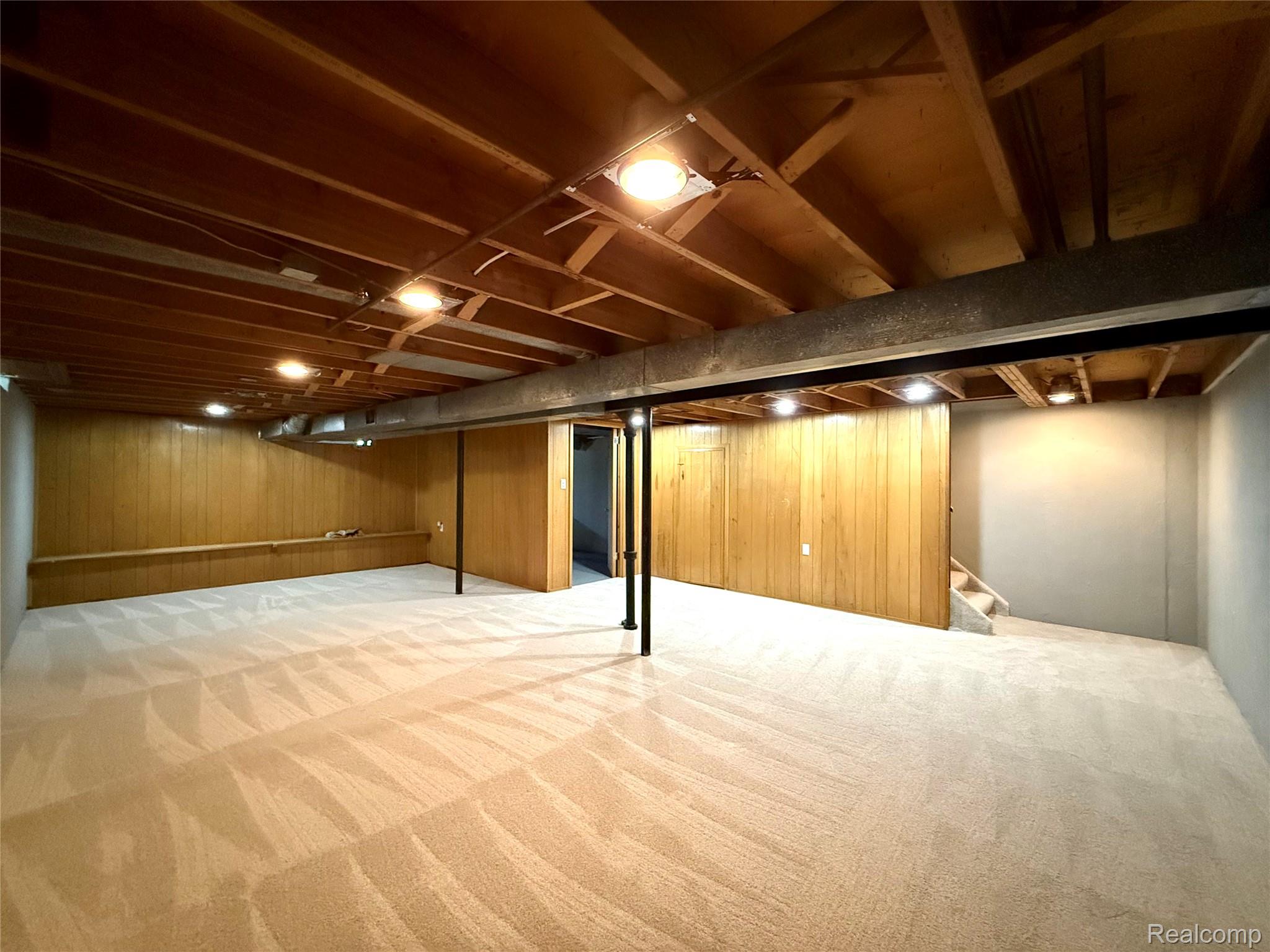 39909 Lynn Street Canton, MI 48187 - Photo 33 of 45 Spacious lower-level area with light-colored carpeting