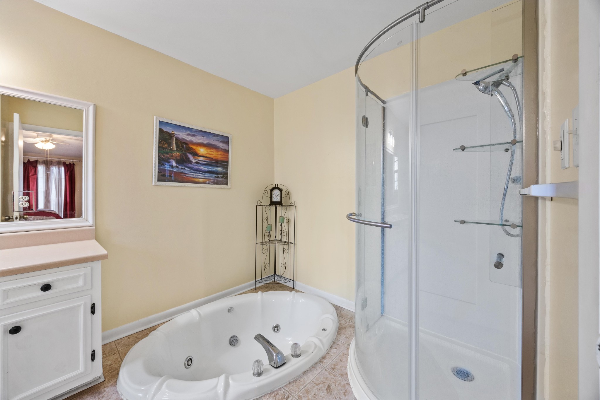 631 Holt Hollow Road Prospect, TN 38477 - Photo 15 of 41 a bathroom with a tub and shower