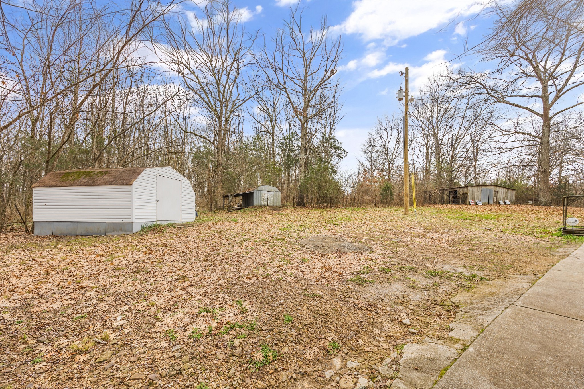 631 Holt Hollow Road Prospect, TN 38477 - Photo 25 of 41 a view of a yard with a house