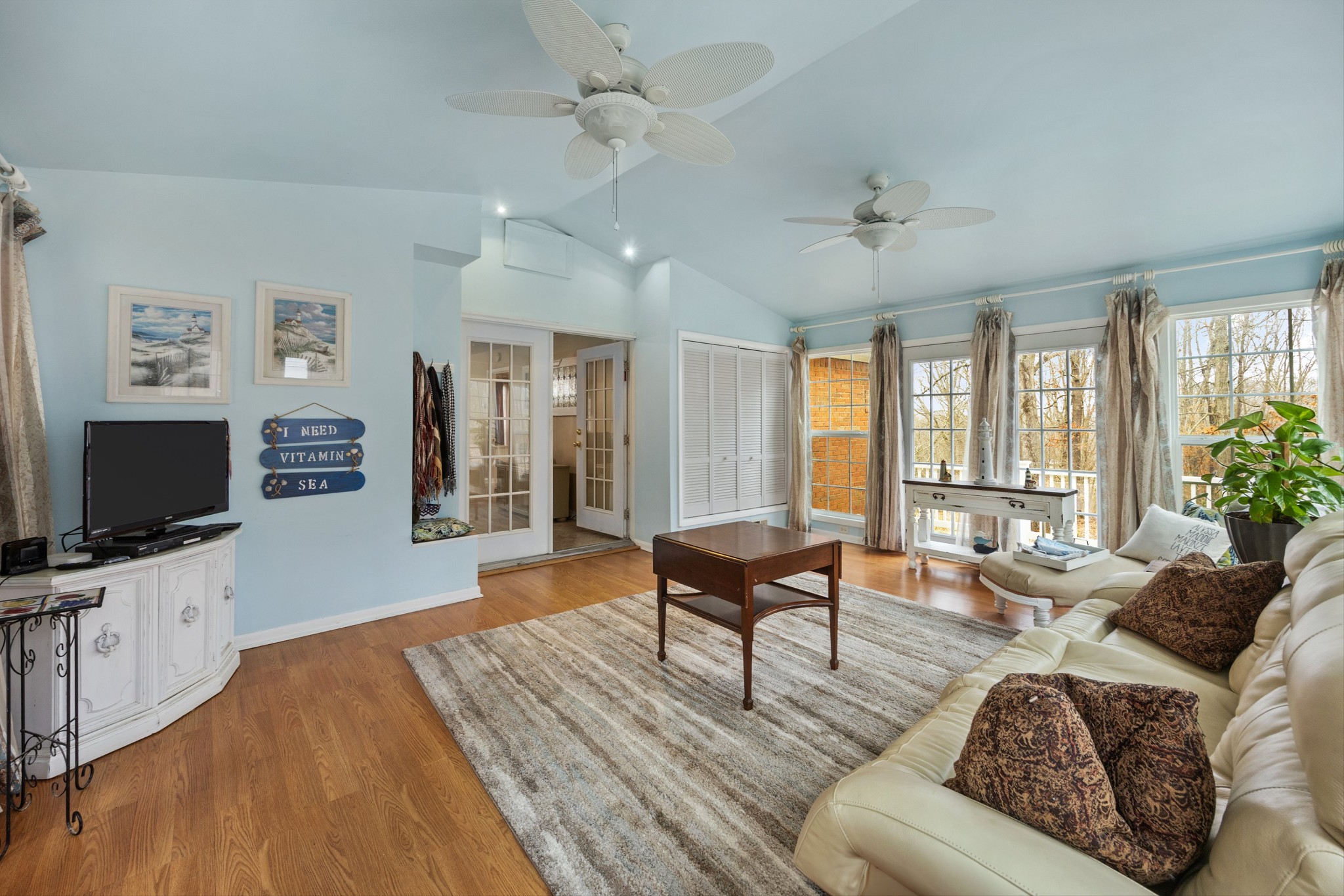 631 Holt Hollow Road Prospect, TN 38477 - Photo 3 of 41 a living room with furniture and a flat screen tv