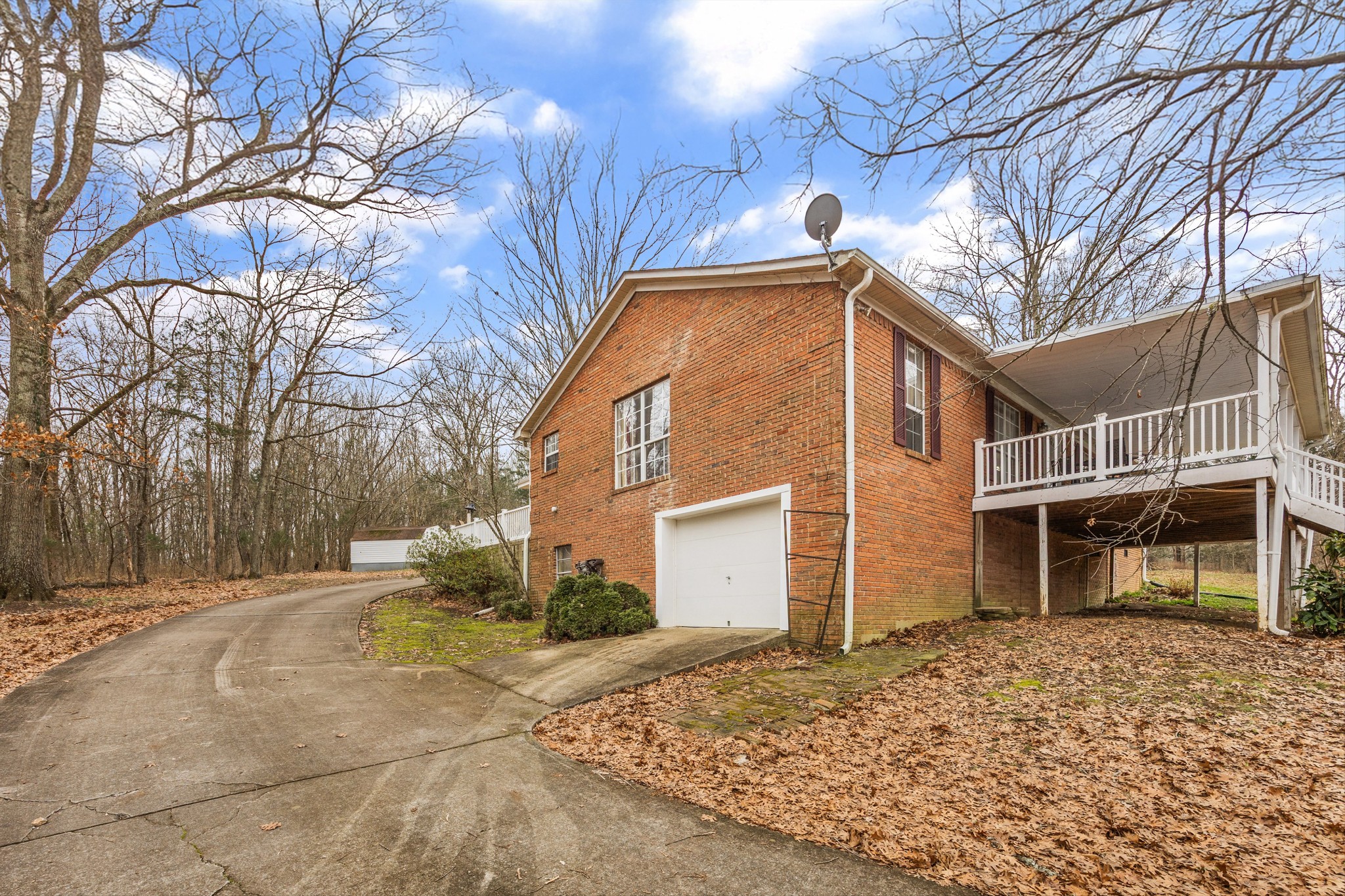 631 Holt Hollow Road Prospect, TN 38477 - Photo 41 of 41 a front view of a house with a yard