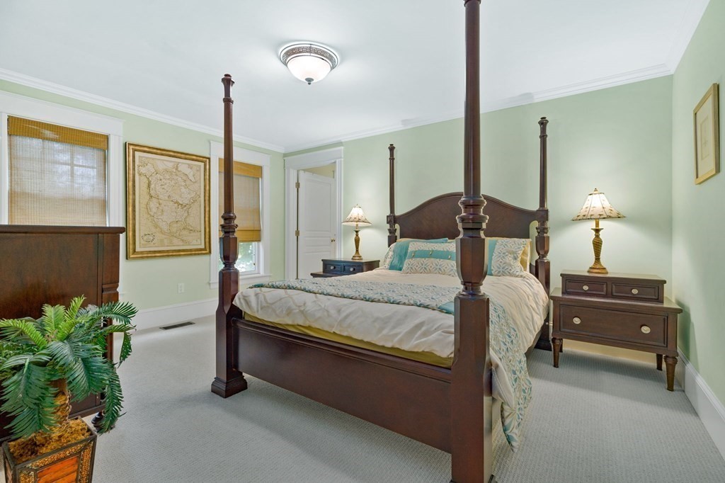 79 Gilson Road Scituate, MA 02066 - Photo 15 of 42 a bedroom with a bed window and lamp