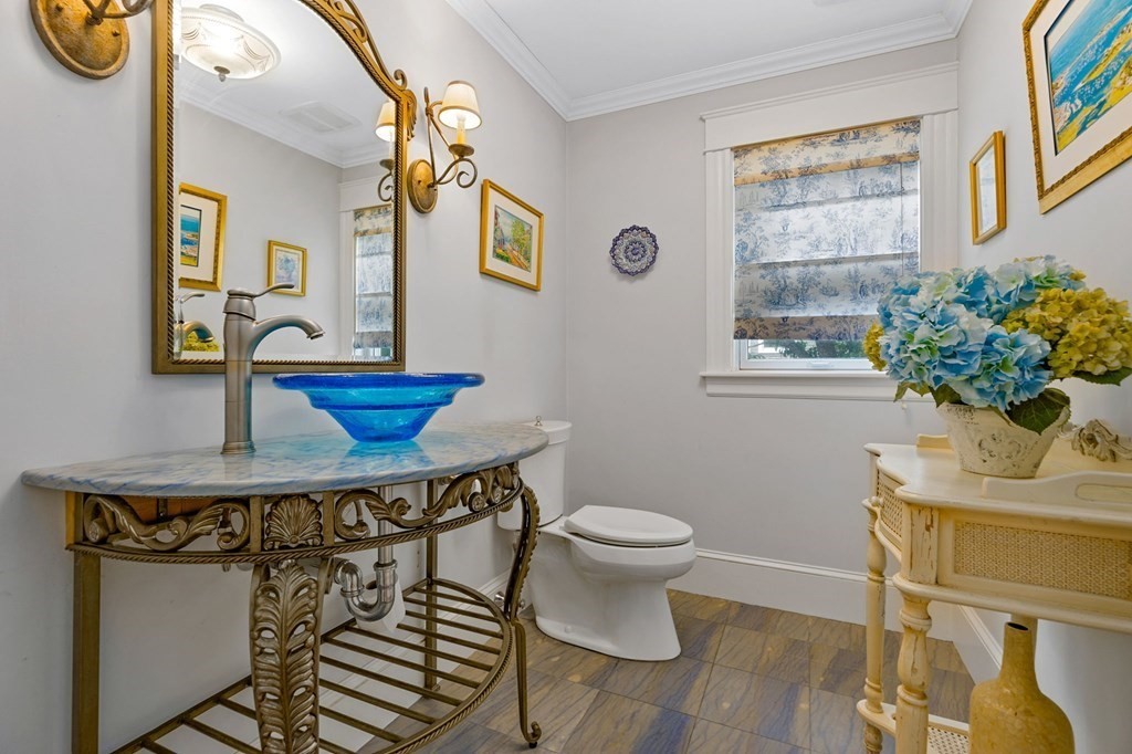 79 Gilson Road Scituate, MA 02066 - Photo 16 of 42 a view of a dining room with furniture and a window