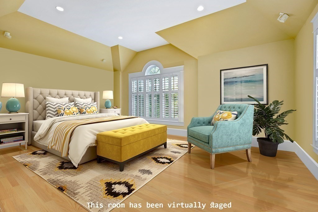 79 Gilson Road Scituate, MA 02066 - Photo 18 of 42 a bedroom with a bed and a potted plant