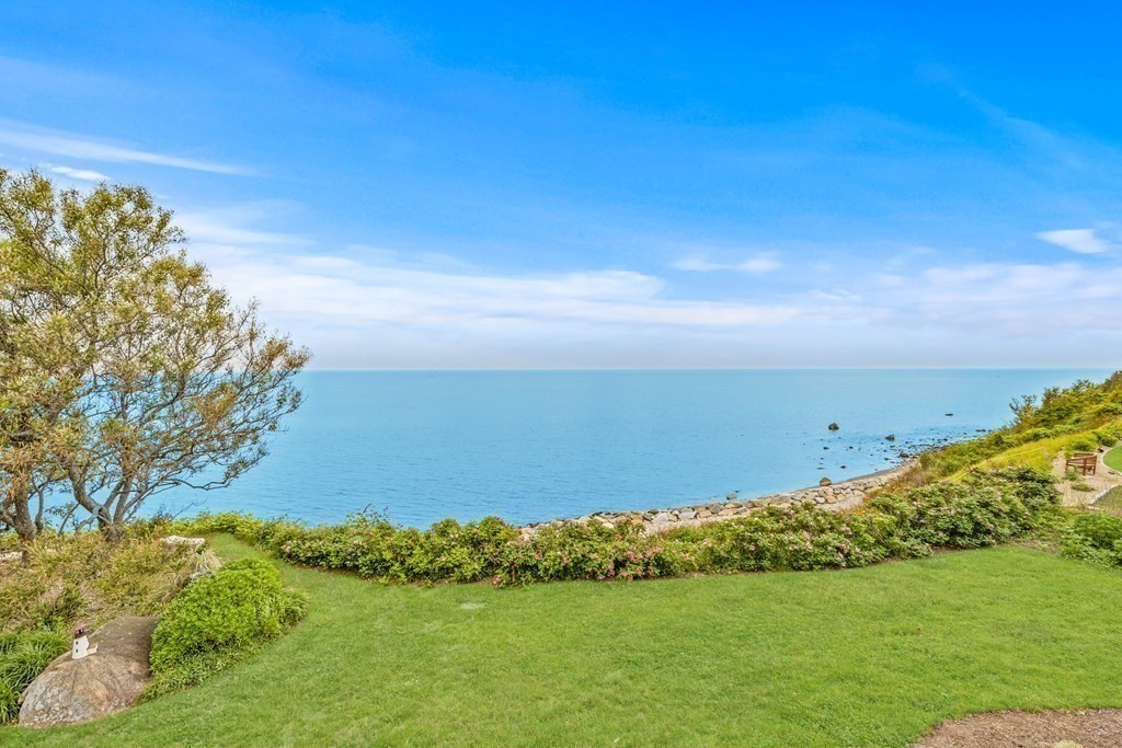 79 Gilson Road Scituate, MA 02066 - Photo 31 of 42 a view of a lake with a yard