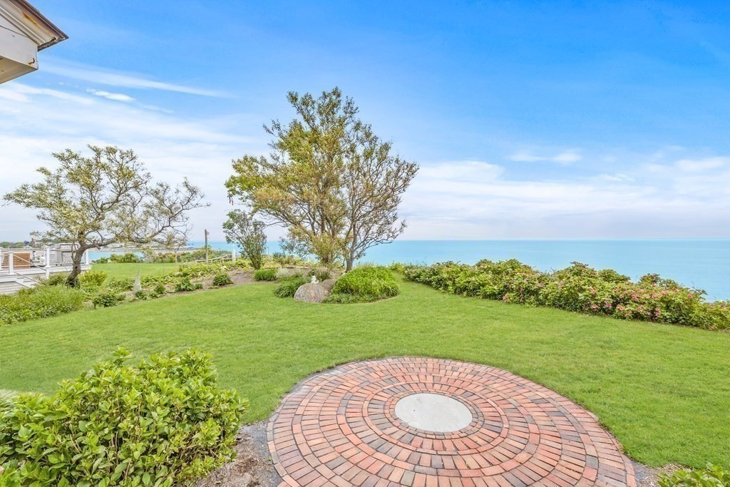 79 Gilson Road Scituate, MA 02066 - Photo 32 of 42 a view of a golf course with a garden
