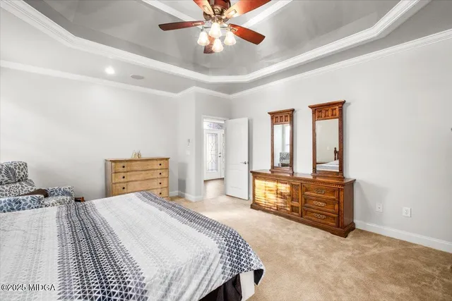 a bathroom with a tub shower and window
