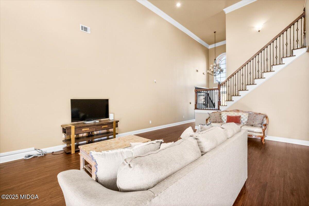 204 Cashmere Court Centerville, GA 31028 - Photo 18 of 51 a living room with furniture and a flat screen tv