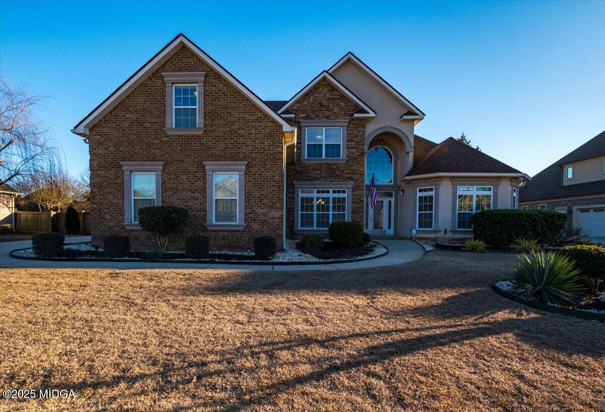 204 Cashmere Court Centerville, GA 31028 - Photo 20 of 51 a front view of a house with garden