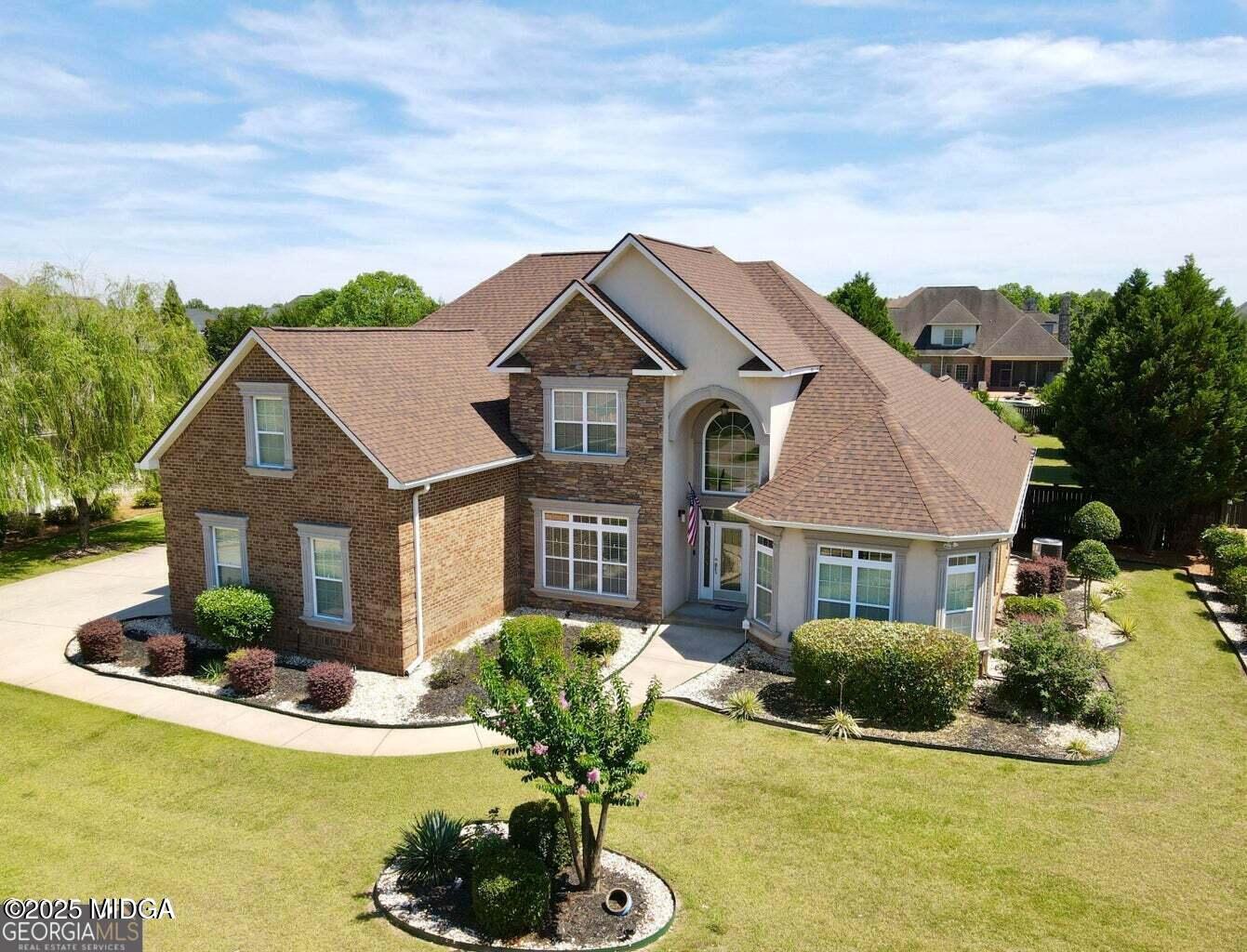 204 Cashmere Court Centerville, GA 31028 - Photo 2 of 51 a view of a house with swimming pool and sitting area