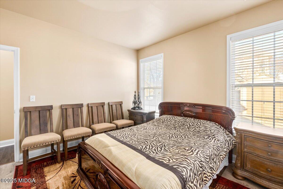 204 Cashmere Court Centerville, GA 31028 - Photo 29 of 51 a bedroom with two beds and a large window