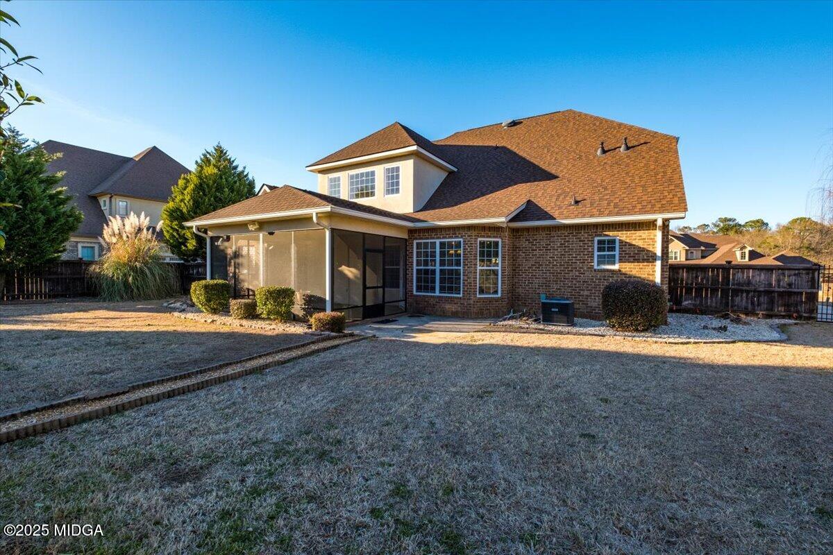 204 Cashmere Court Centerville, GA 31028 - Photo 46 of 51 a front view of a house with a yard table and chairs