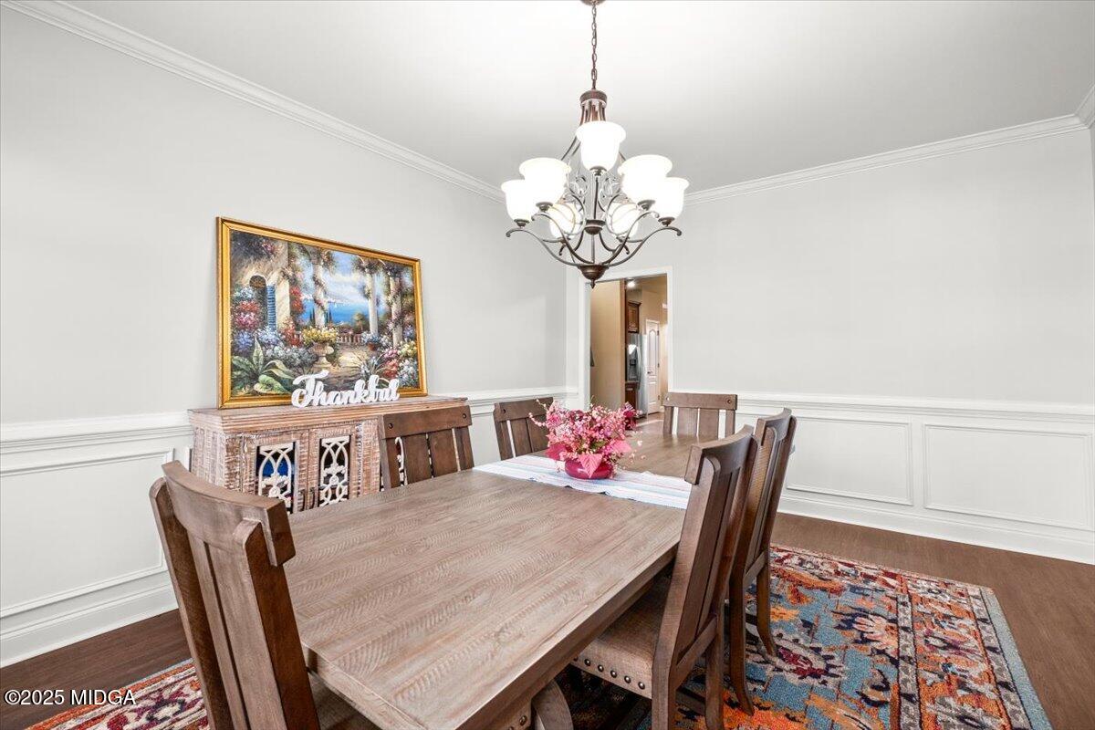 204 Cashmere Court Centerville, GA 31028 - Photo 7 of 51 a view of a dining room with furniture and wooden floor